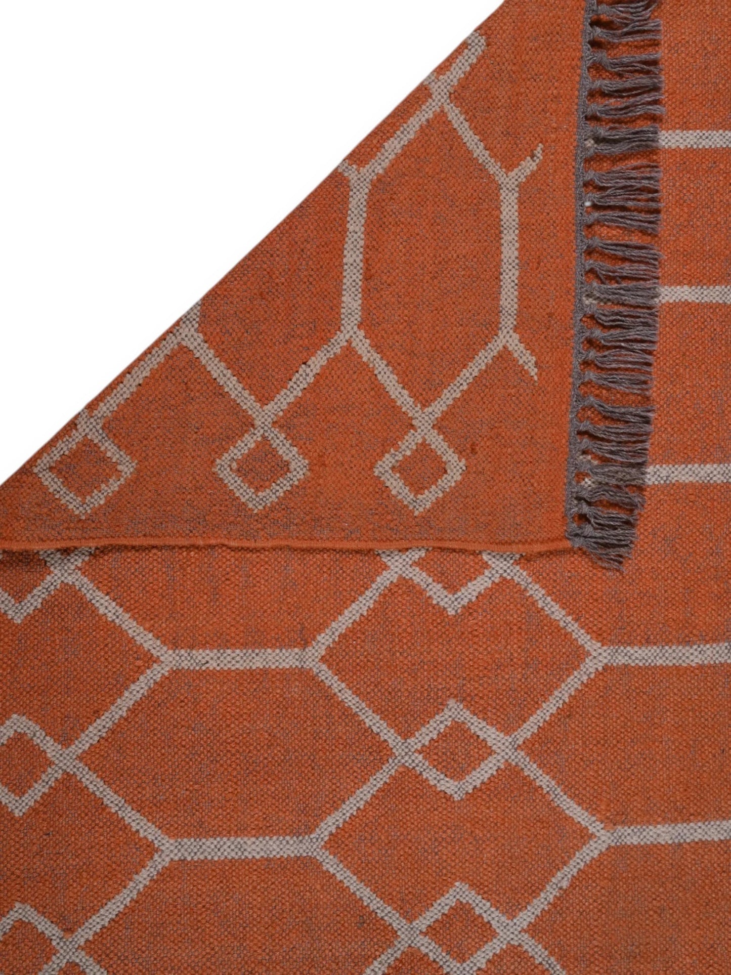 Detalle de alfombra kilim pasillo 120x80 rojo hecha a mano en fibras naturales