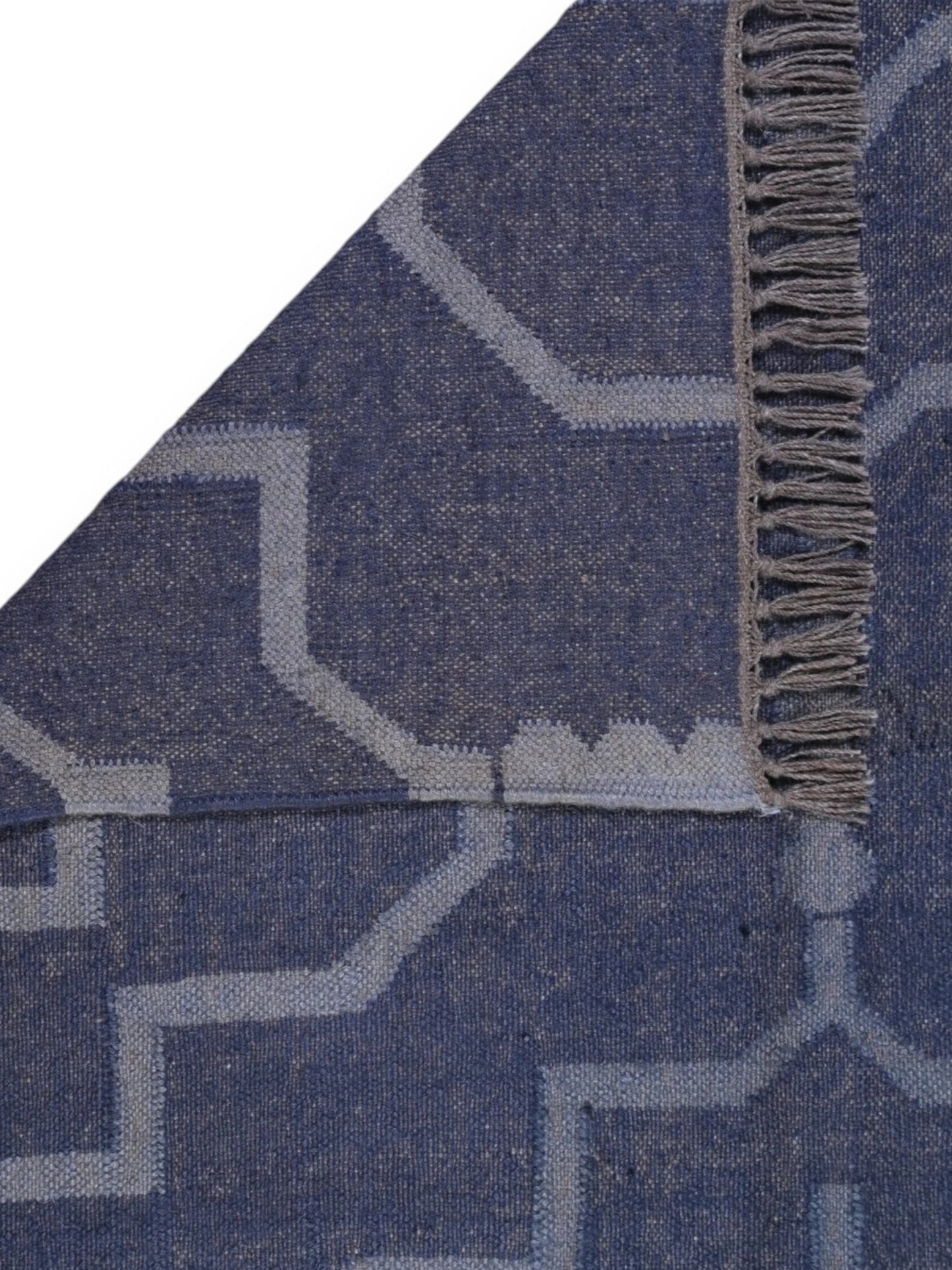 Detalle de alfombra kilim pasillo 120x80 azul hecha a mano en fibras naturales