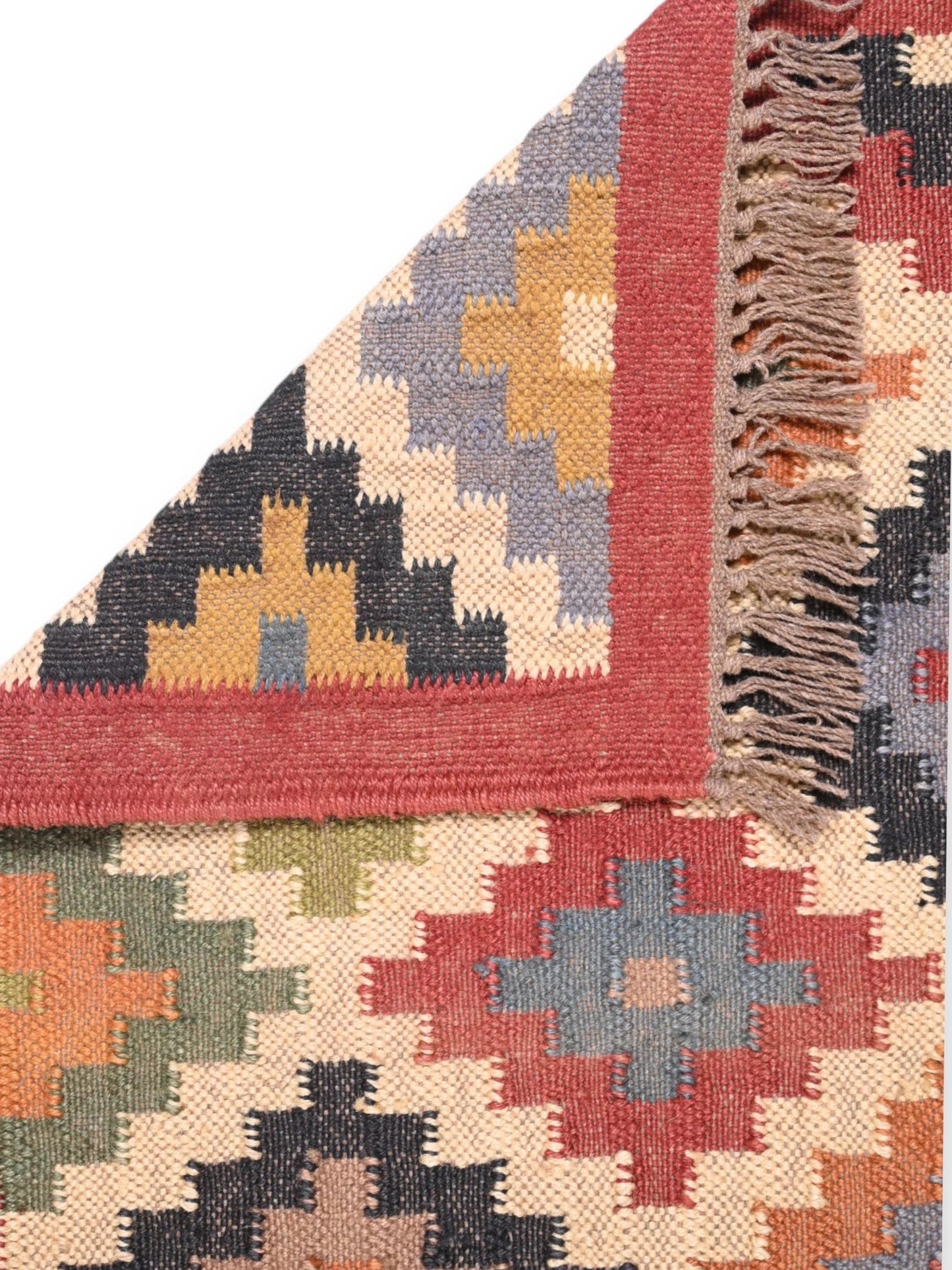 Detalle de alfombra kilim pasillo 60x180 multicolor hecha a mano en fibras naturales