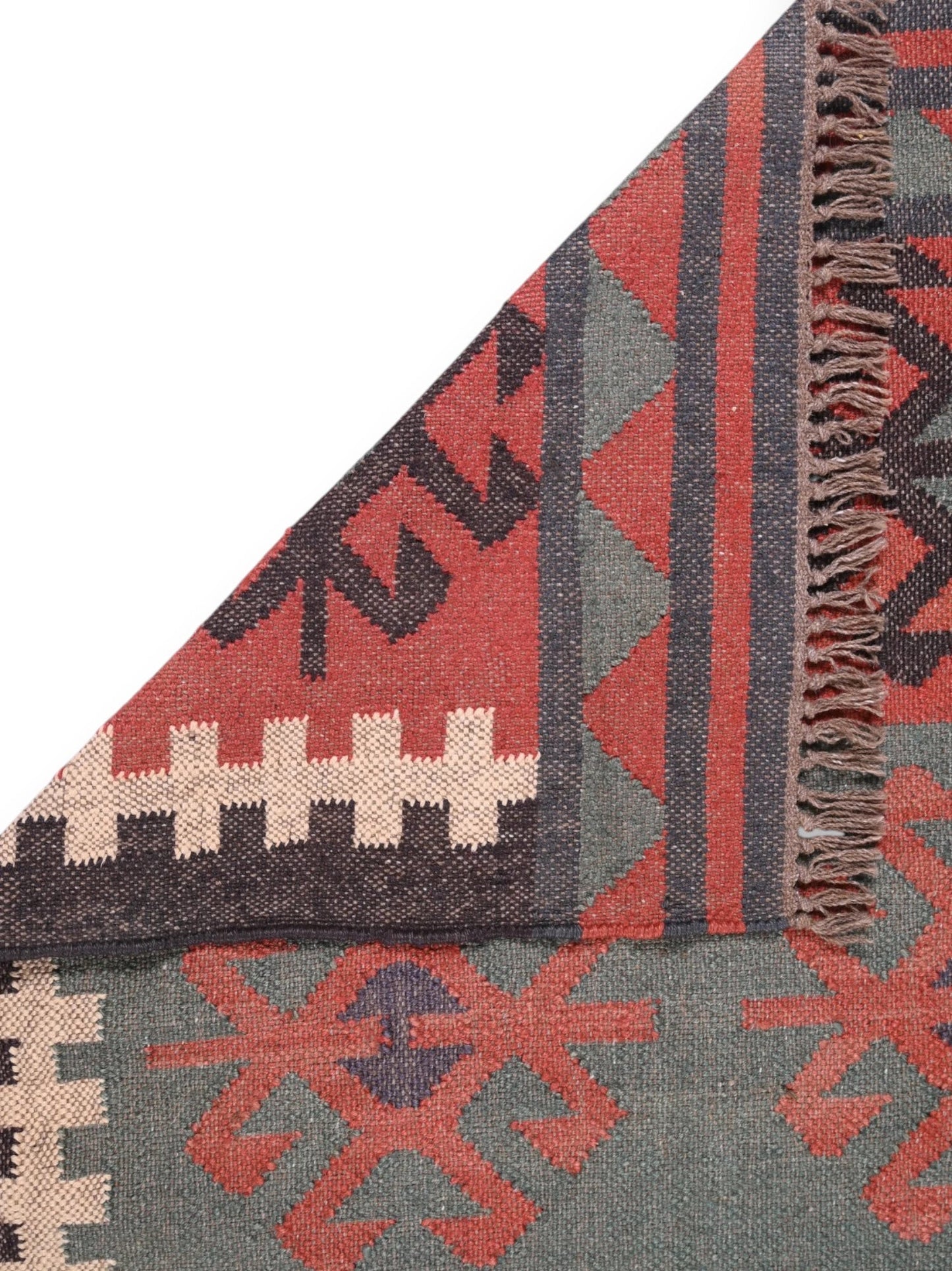 Detalle de alfombra kilim pasillo 90x150 multicolor hecha a mano en fibras naturales